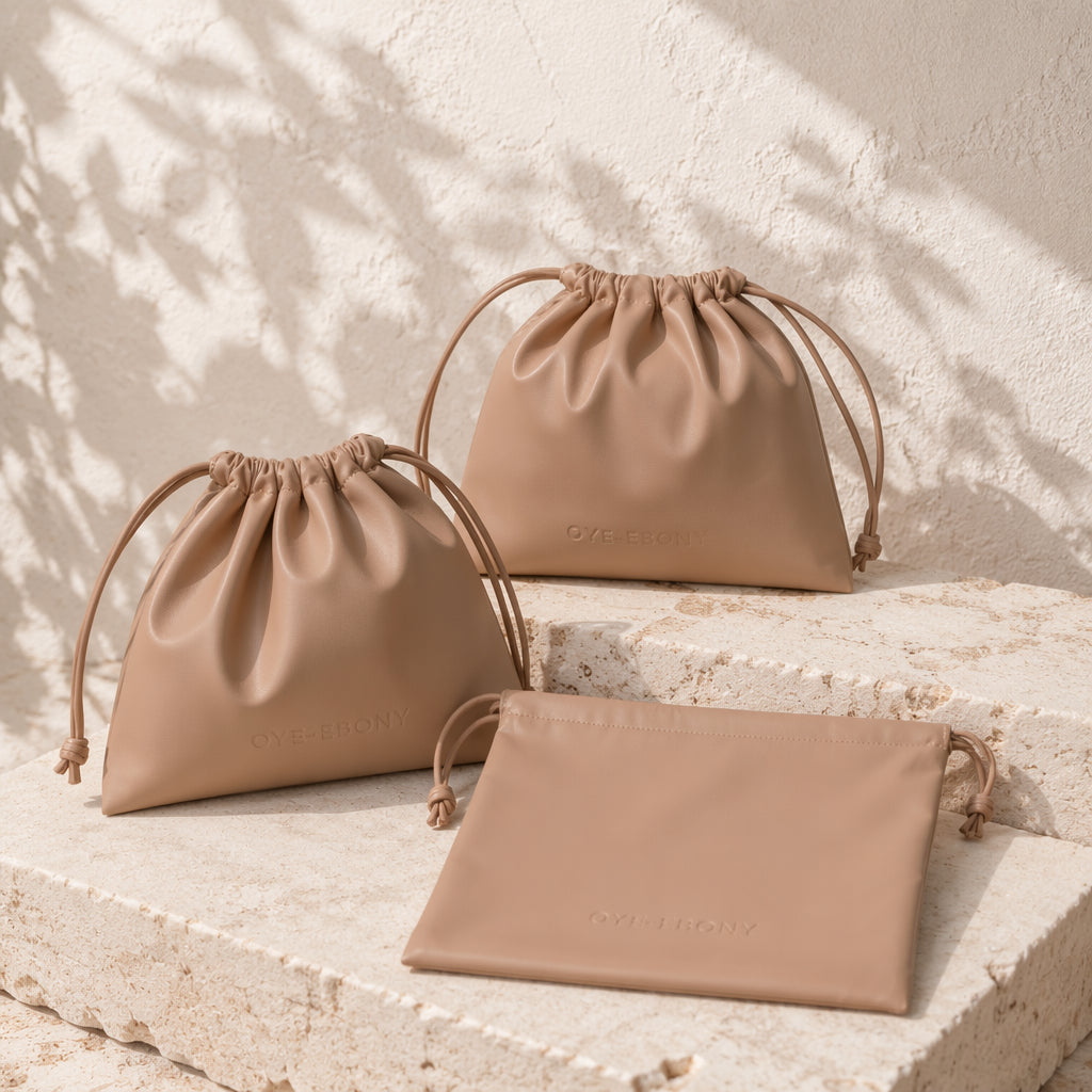 OYE-EBONY ESSENTIALS POUCH